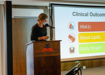 Researcher presenting clinical outcomes related to blood glucose, lipids and body weight at DNSG 2026.